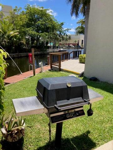 6 Royal Palm Way, Unit 310 Boca Raton, FL 33432 - Photo 28 of 37 a view of a backyard with sitting area