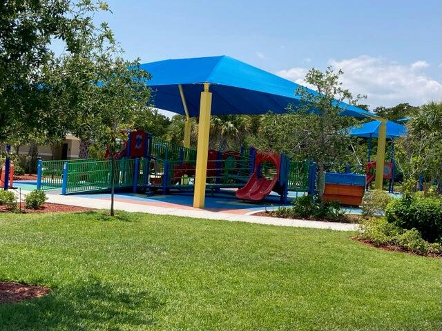 6 Royal Palm Way, Unit 310 Boca Raton, FL 33432 - Photo 30 of 37 a view of a house with a yard and sitting area