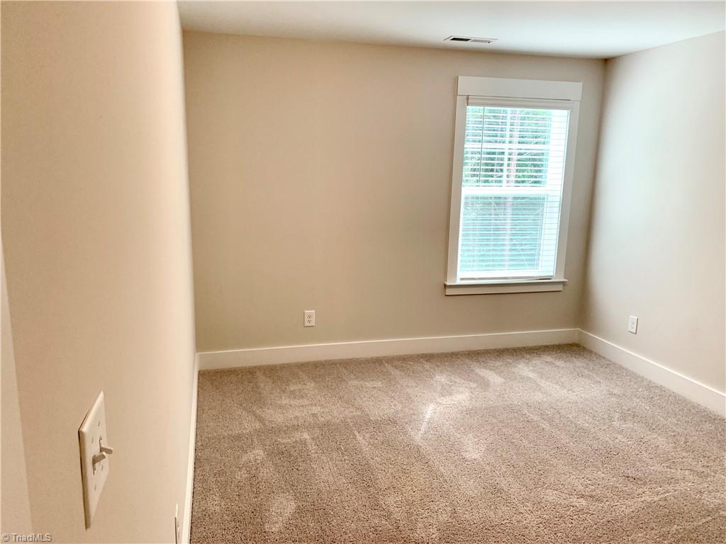 5112 Moonlight Ridge Drive Greensboro, NC 27455 - Photo 18 of 30 Second bedroom