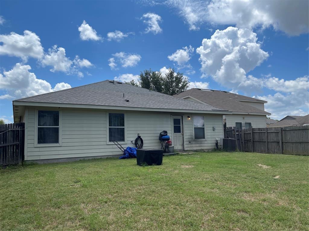 7554 Rice Lane Dallas, TX 75241 - Photo 16 of 16 a view of a house with a garden