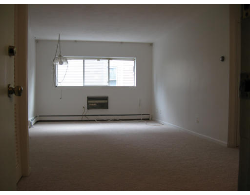 1409 River Street, Unit 23 Boston, MA 02136 - Photo 5 of 6 a view of empty room with window
