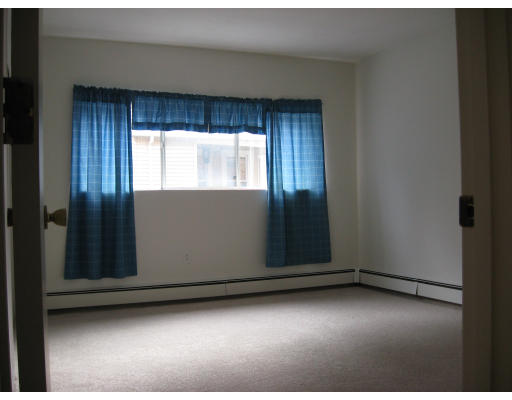 1409 River Street, Unit 23 Boston, MA 02136 - Photo 6 of 6 a view of an empty room and window