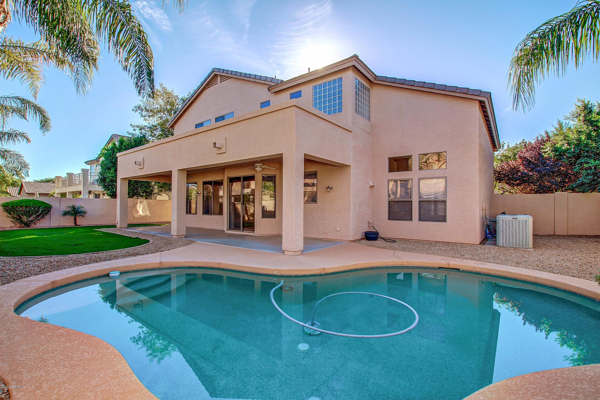 1360 East Harrison Street Gilbert, AZ 85295 - Photo 30 of 34 a view of a house with a swimming pool