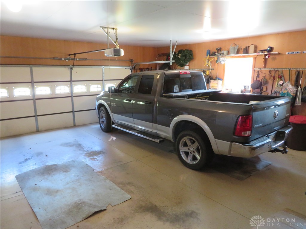 748 Inlow Avenue Peebles, OH 45660 - Photo 27 of 61 This spacious garage offers ample room for vehicles and features convenient overhead storage.