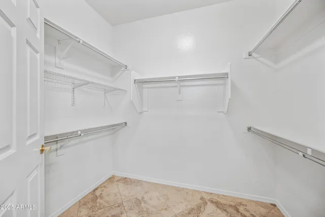 a view of a room with racks on the wall