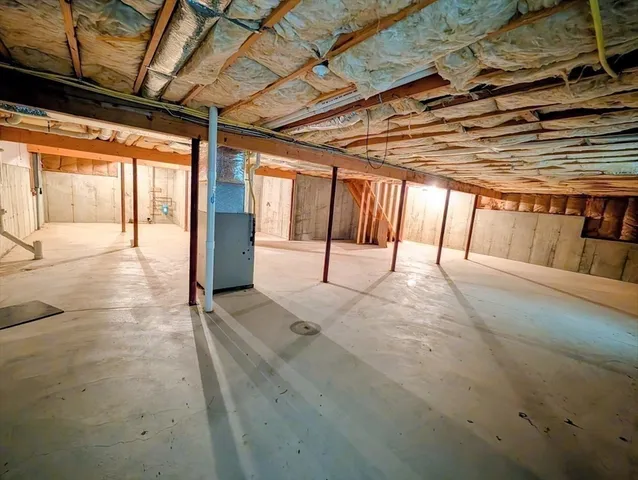 a backyard of a house with lots of green space and fountain