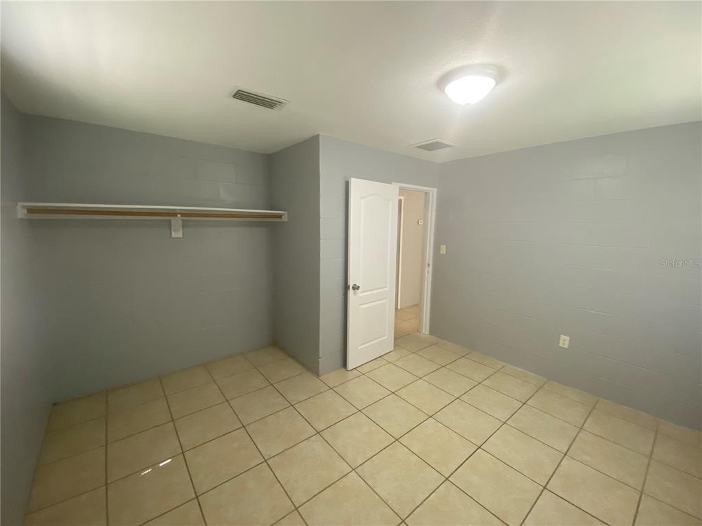 1119 McNamee Street, Unit B Leesburg, FL 34748 - Photo 11 of 13 a view of an empty room