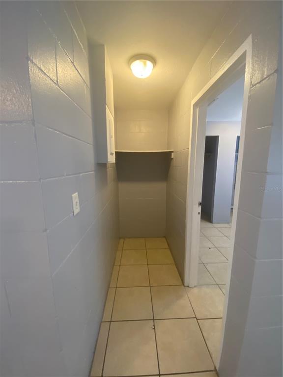 1119 McNamee Street, Unit B Leesburg, FL 34748 - Photo 5 of 13 a bathroom with a sink and mirror