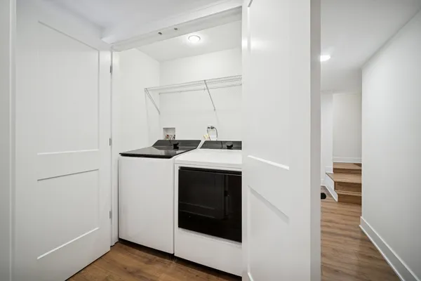 a utility room with washer and dryer