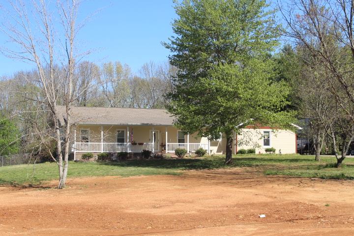 2075 Lock B Road North Clarksville, TN 37043 - Photo 1 of 26 a front view of a house with a yard