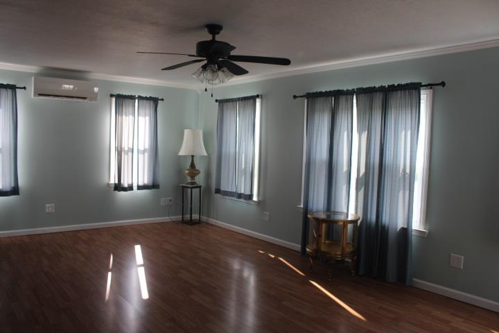 2075 Lock B Road North Clarksville, TN 37043 - Photo 16 of 26 a view of empty room with wooden floor and fan