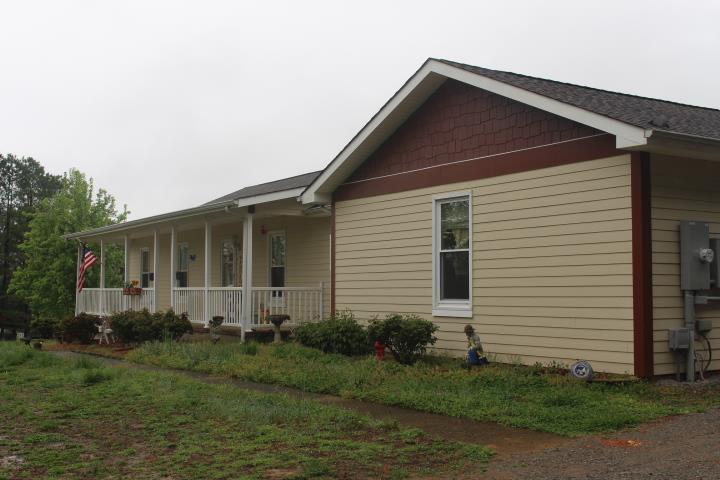 2075 Lock B Road North Clarksville, TN 37043 - Photo 3 of 26 a front view of a house with garden