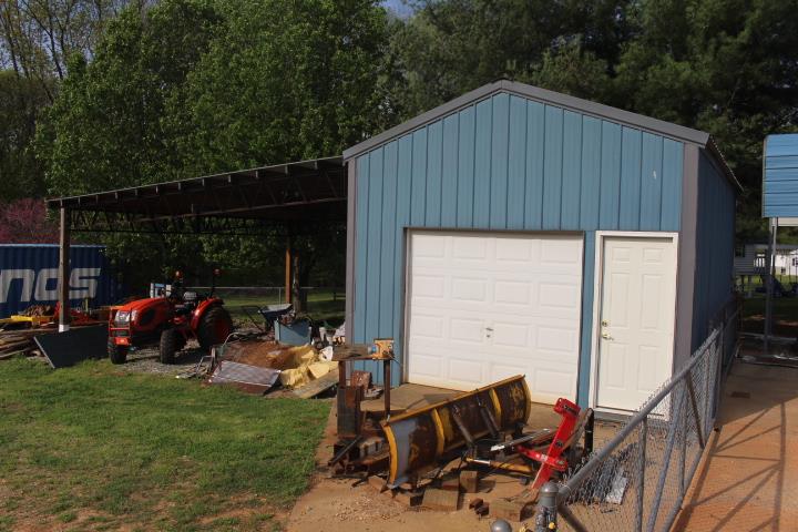 2075 Lock B Road North Clarksville, TN 37043 - Photo 9 of 26 a view of a two chairs in the back yard of the house