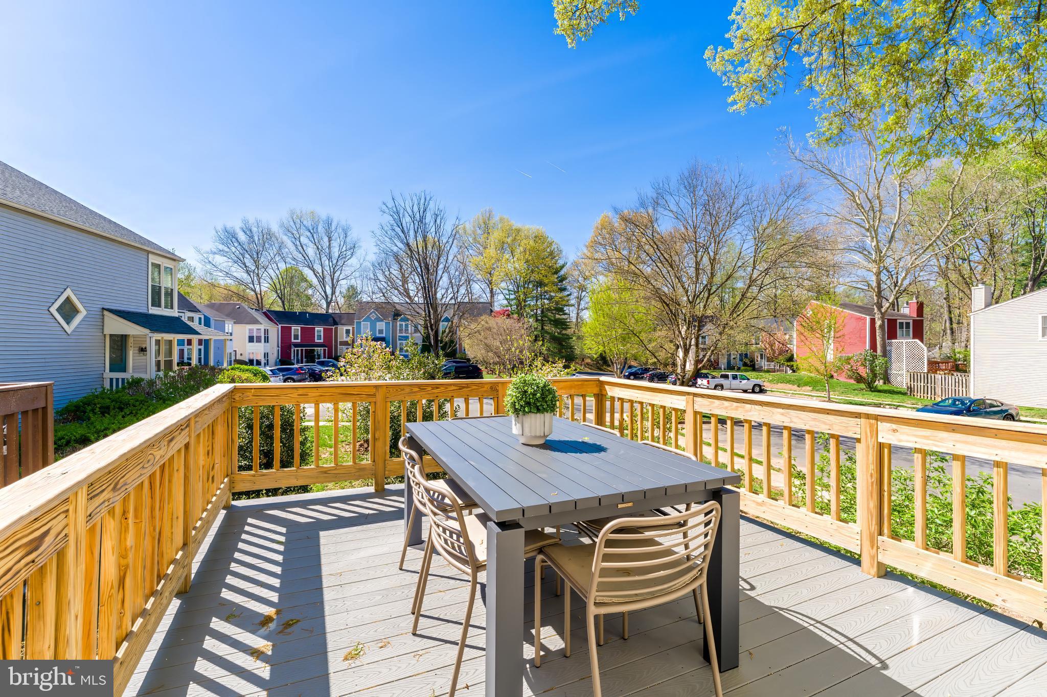 11257 Silentwood Lane Reston, VA 20191 - Photo 19 of 44 a view of a chairs and table on the balcony