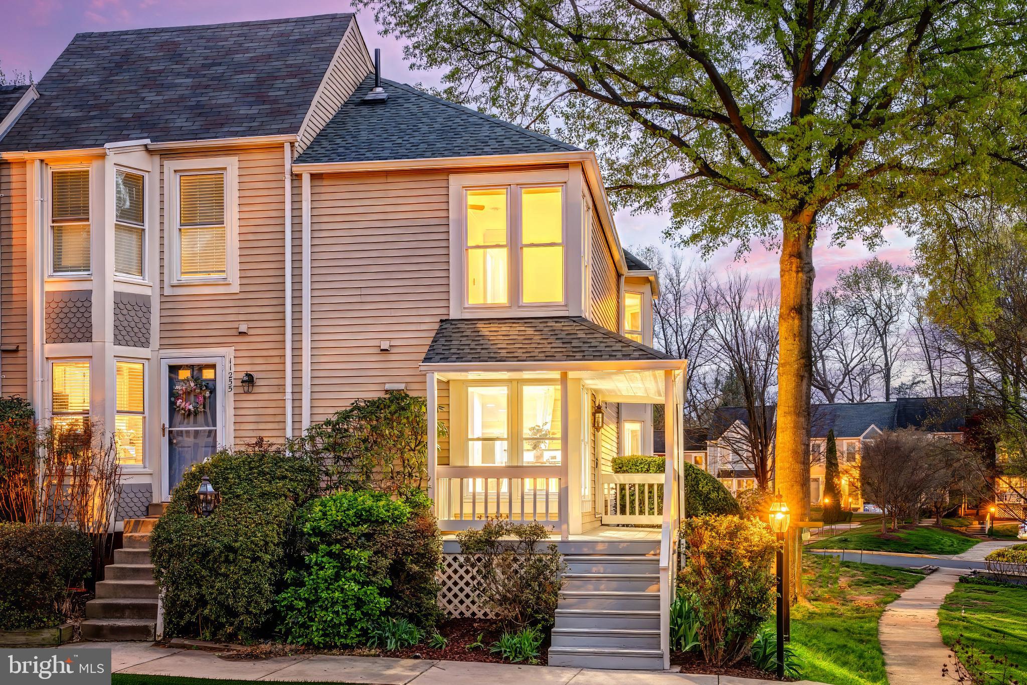 11257 Silentwood Lane Reston, VA 20191 - Photo 2 of 44 a front view of a house with a yard