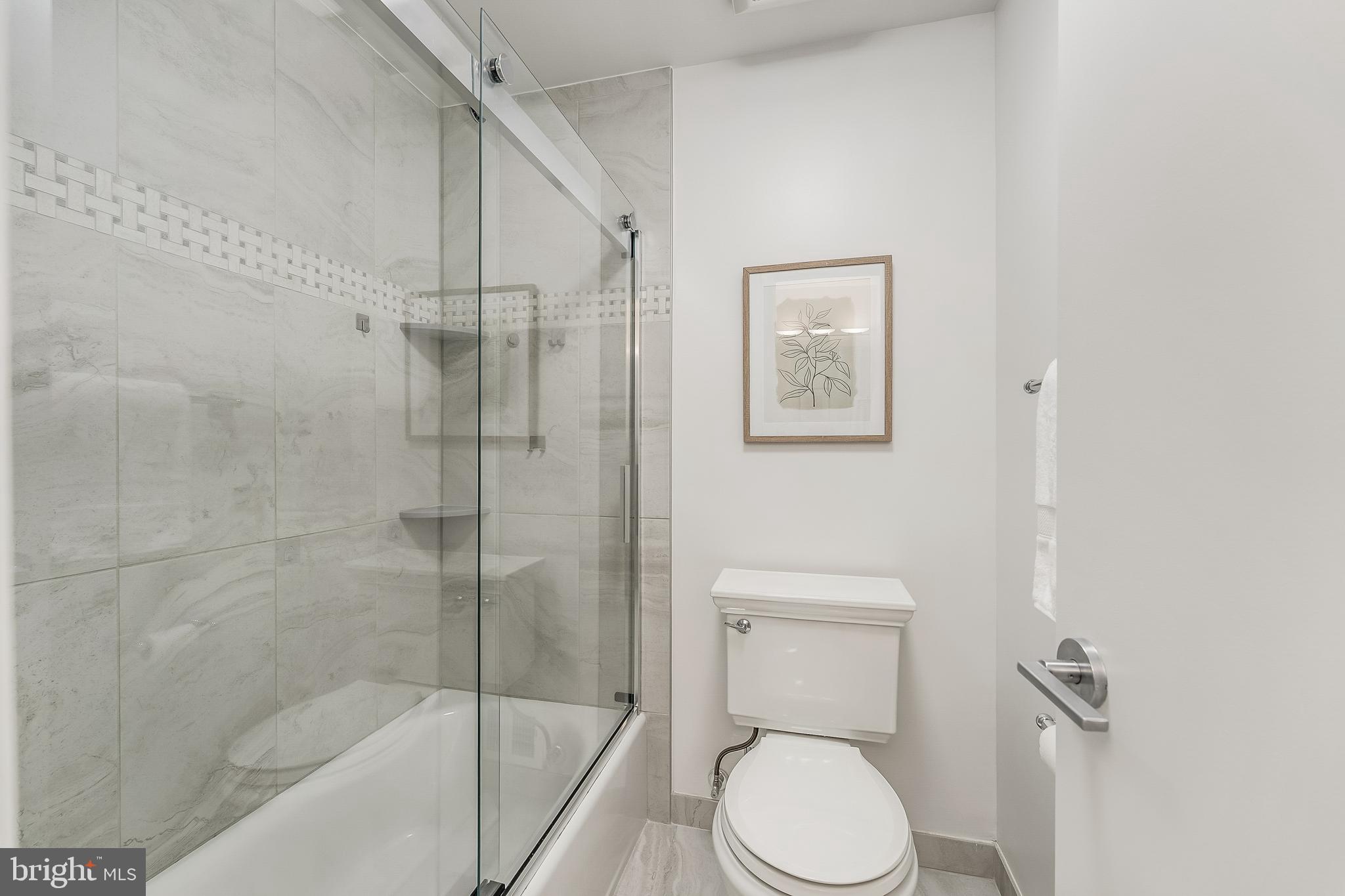 11257 Silentwood Lane Reston, VA 20191 - Photo 30 of 44 a white toilet sitting next to a bathroom sink