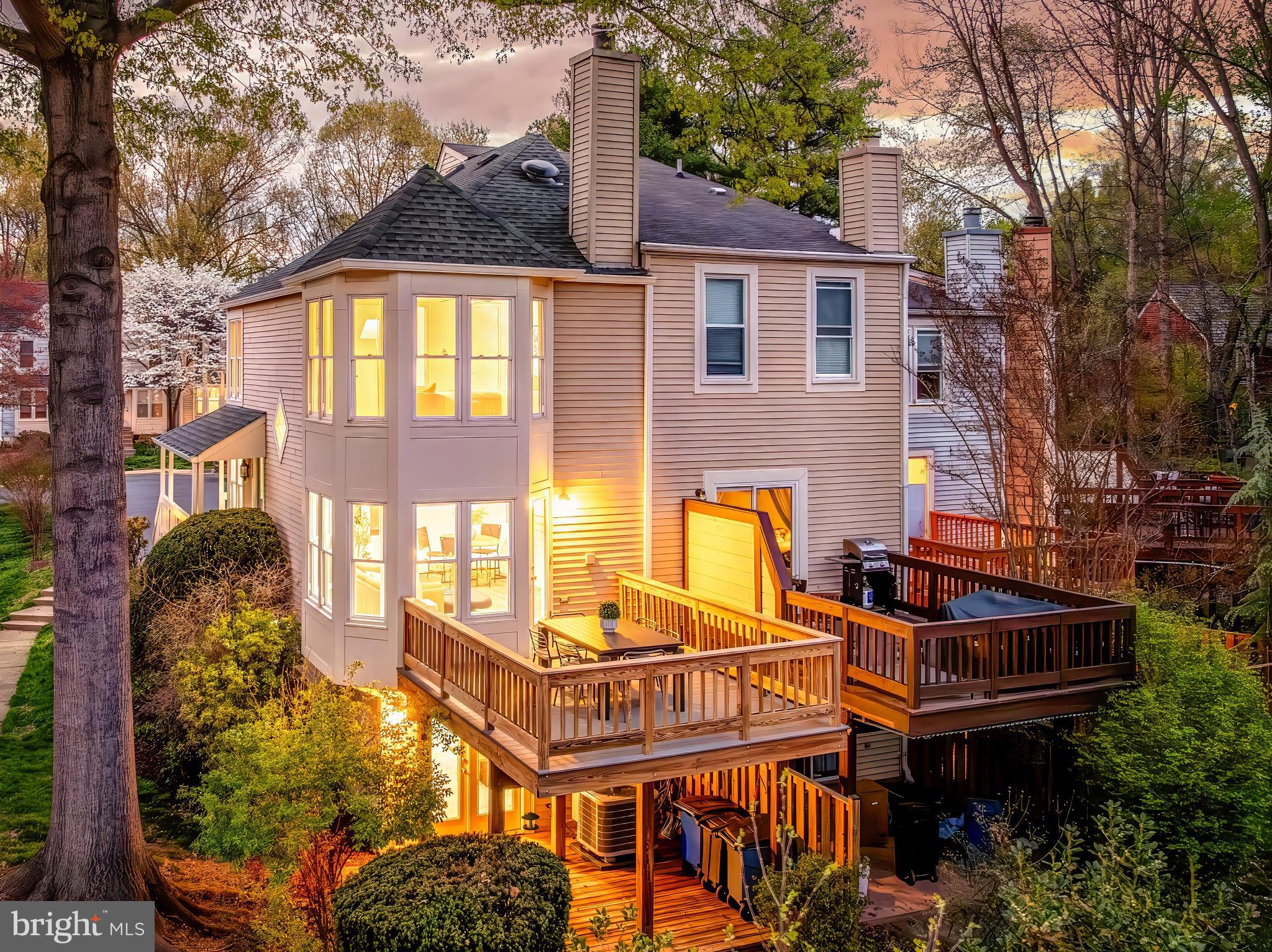 11257 Silentwood Lane Reston, VA 20191 - Photo 3 of 44 a front view of a house with a garden