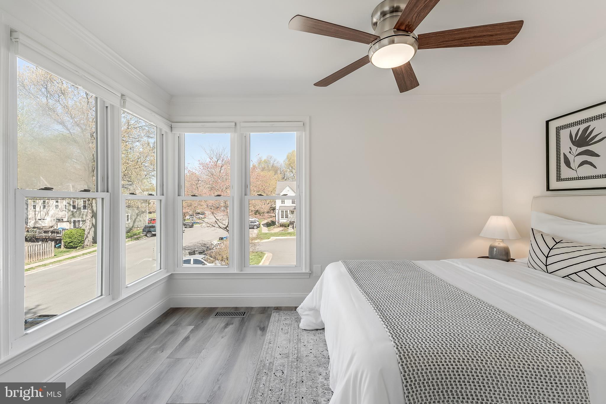 11257 Silentwood Lane Reston, VA 20191 - Photo 35 of 44 a bedroom with a large bed and a window