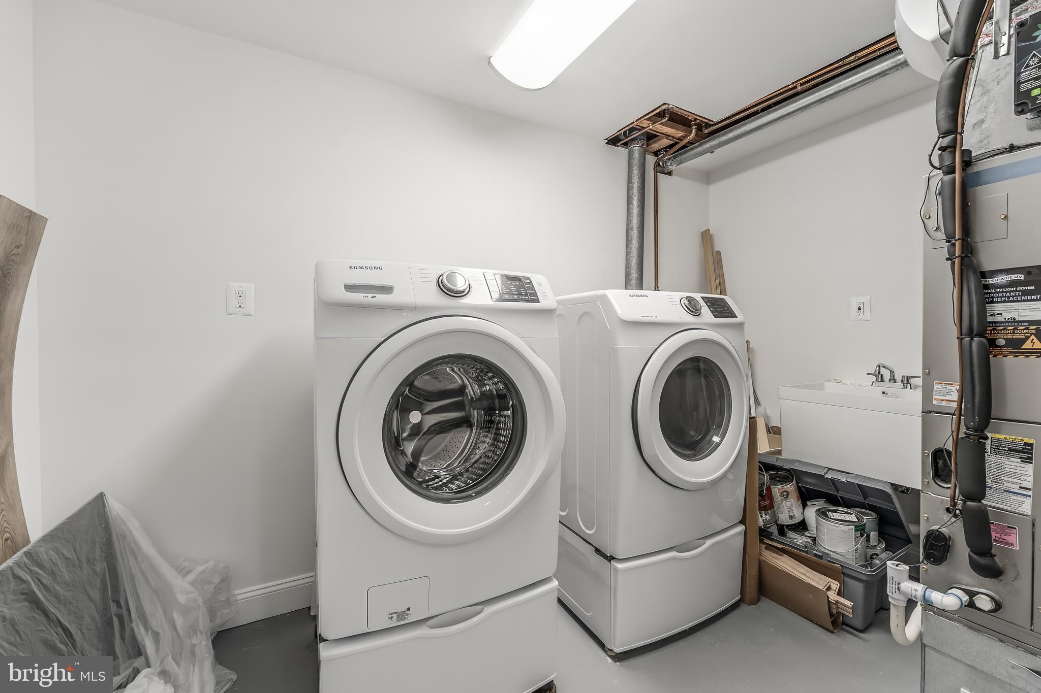 11257 Silentwood Lane Reston, VA 20191 - Photo 39 of 44 a utility room with dryer and washer