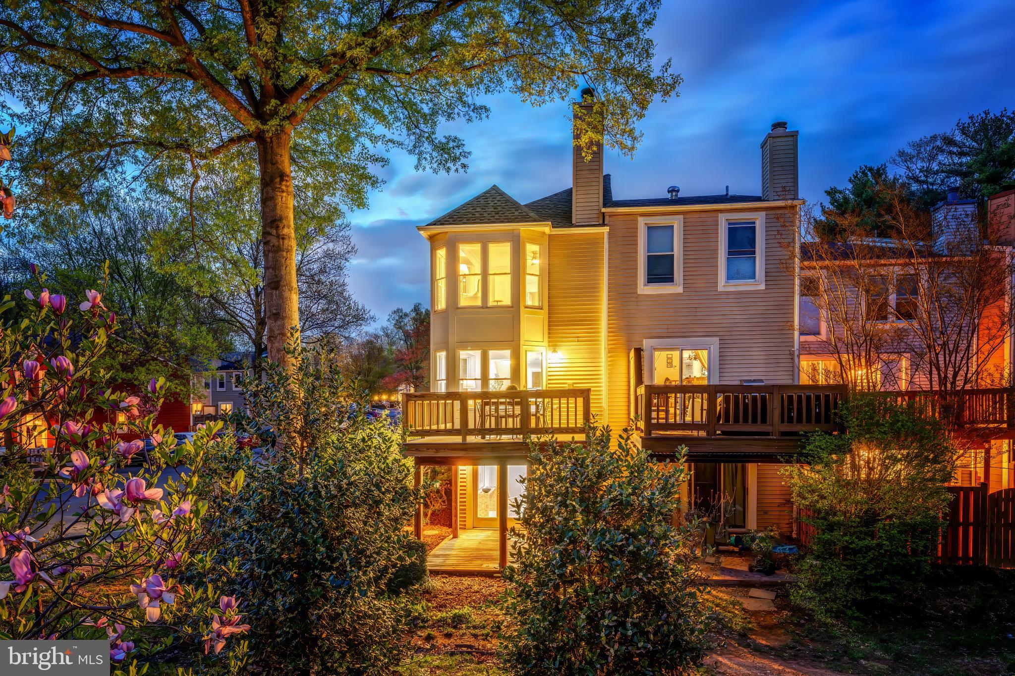 11257 Silentwood Lane Reston, VA 20191 - Photo 4 of 44 a front view of a house with a yard