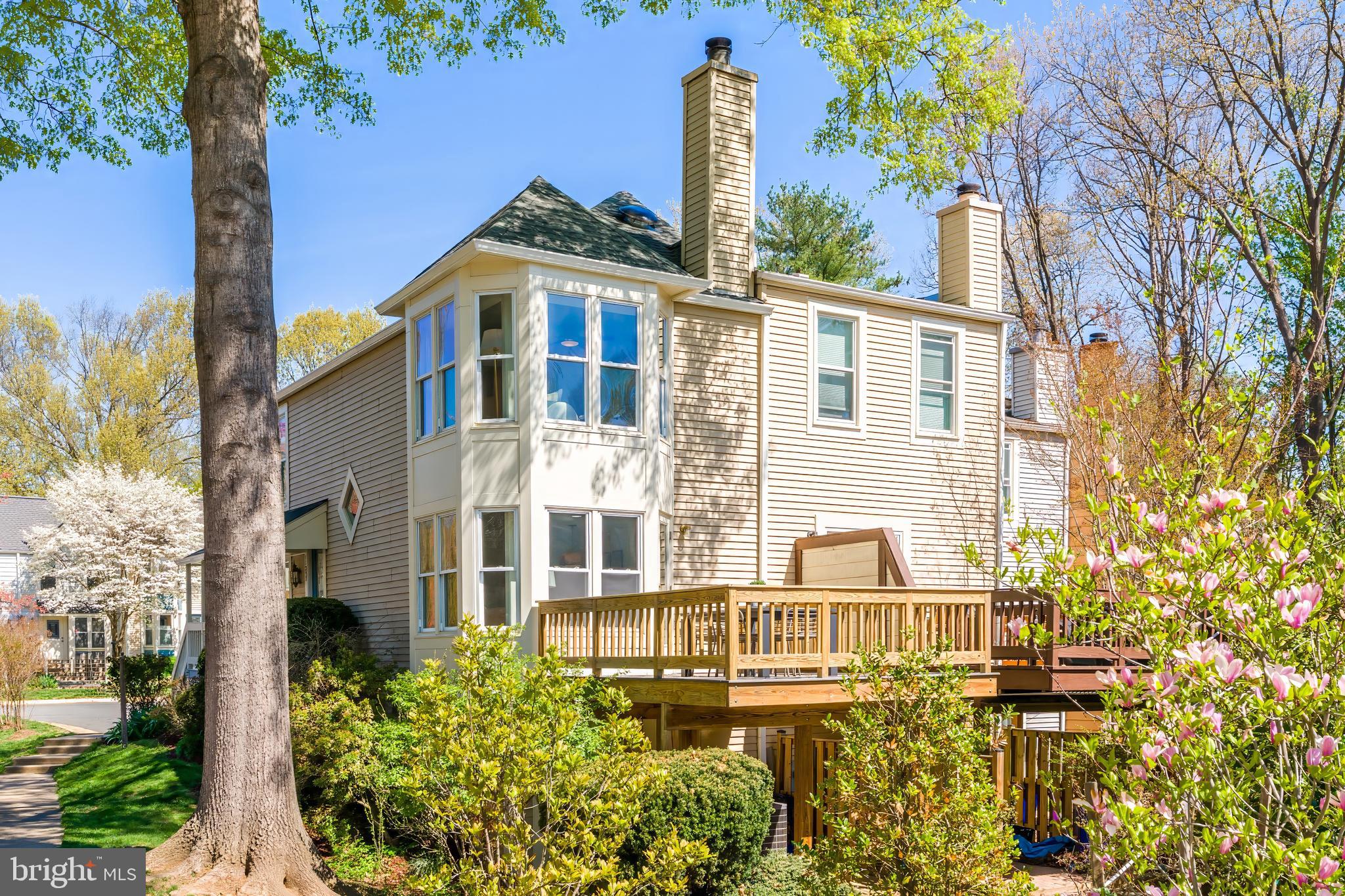 11257 Silentwood Lane Reston, VA 20191 - Photo 42 of 44 a front view of a house with a garden
