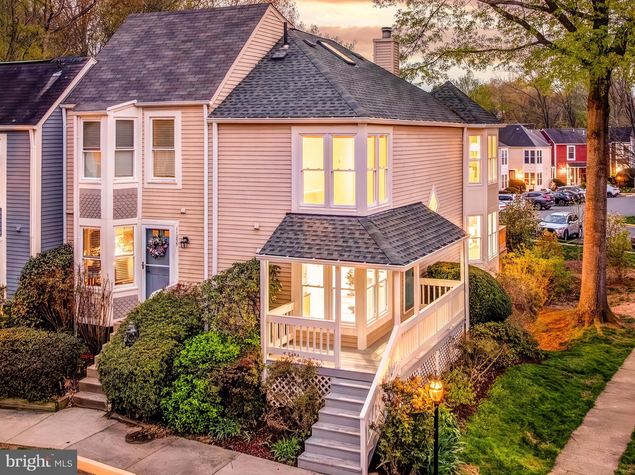 11257 Silentwood Lane Reston, VA 20191 - Photo 5 of 44 a front view of a house with a yard