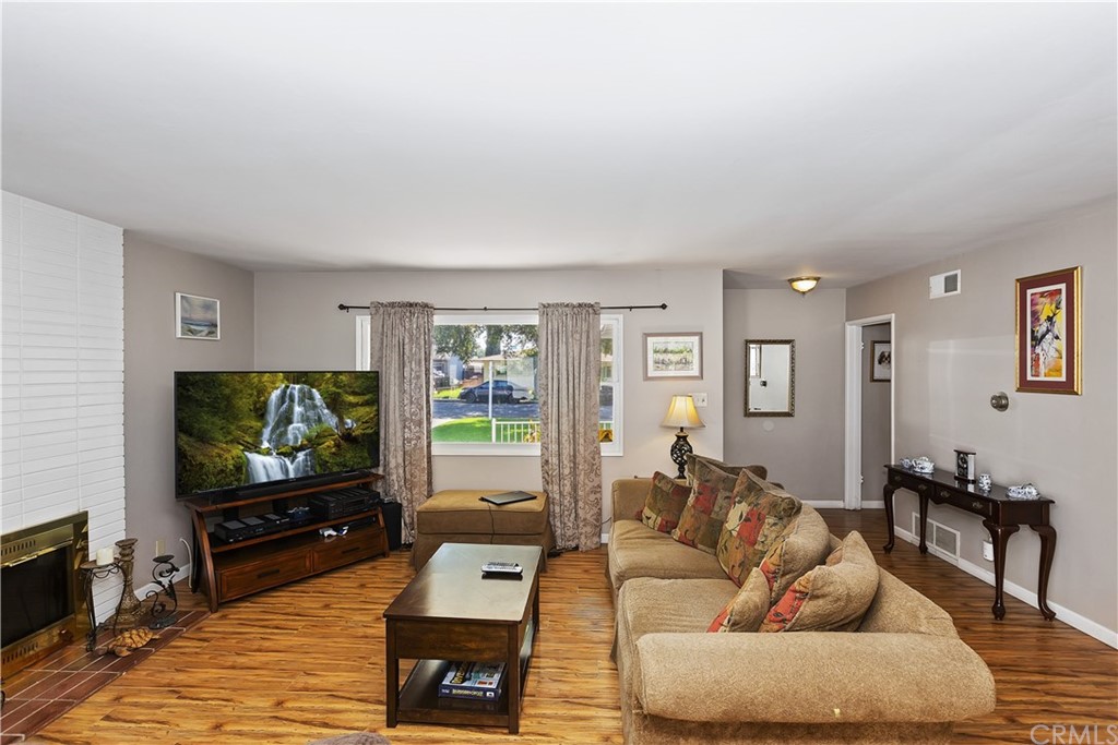 3451 Mono Drive Riverside, CA 92506 - Photo 12 of 24 a living room with furniture and a flat screen tv