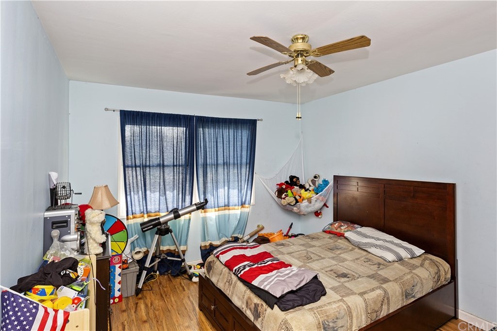 3451 Mono Drive Riverside, CA 92506 - Photo 17 of 24 a bedroom with bed and a window