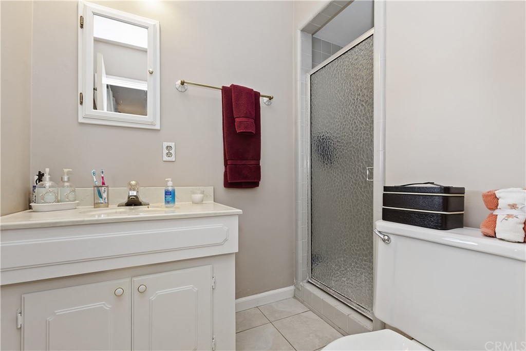 3451 Mono Drive Riverside, CA 92506 - Photo 18 of 24 a bathroom with a sink and a mirror