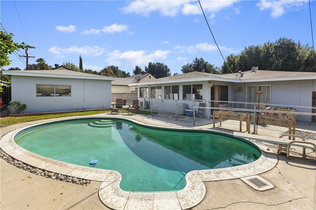 3451 Mono Drive Riverside, CA 92506 - Photo 2 of 24 a view of a house with swimming pool and porch