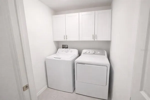 a bathroom with a toilet and a bathtub