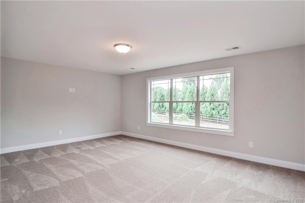 1338 Armstrong Road Belmont, NC 28012 - Photo 14 of 14 an empty room with a window