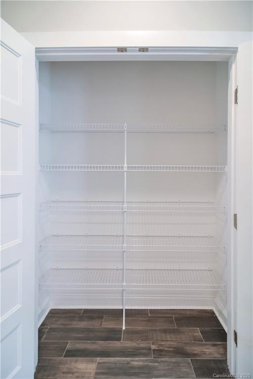 1338 Armstrong Road Belmont, NC 28012 - Photo 4 of 14 a view of a small space built with hardwood