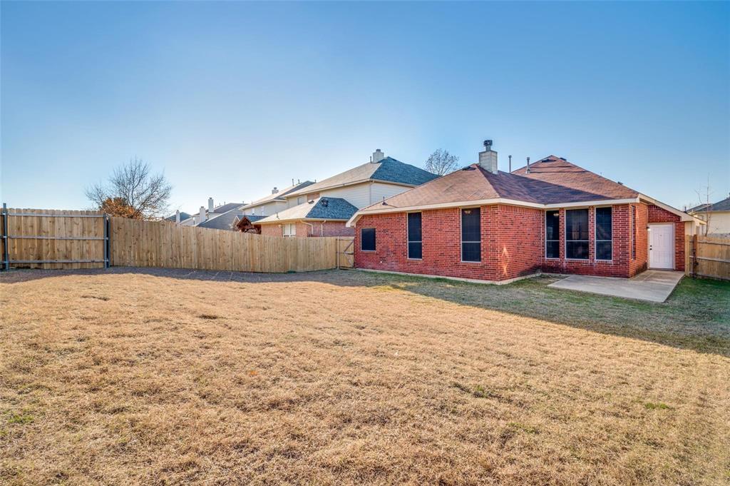 6752 Longhorn Trail Frisco, TX 75034 - Photo 12 of 12 a front view of a house with a yard