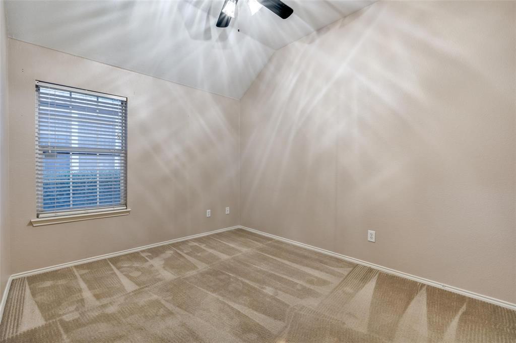 6752 Longhorn Trail Frisco, TX 75034 - Photo 7 of 12 a view of an empty room with a window