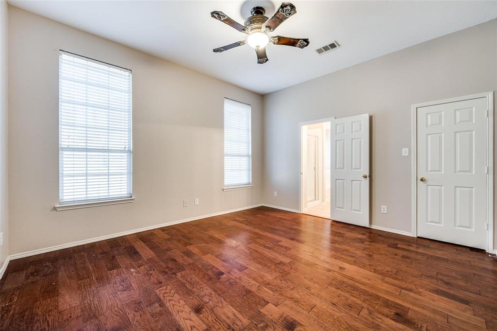 6752 Longhorn Trail Frisco, TX 75034 - Photo 10 of 12 wooden floor in an empty room with a window