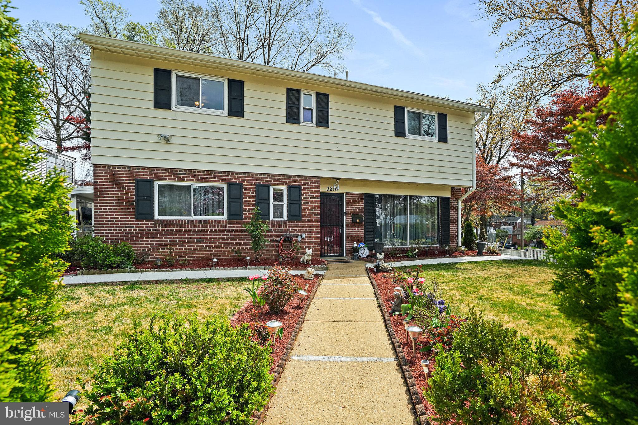 3816 Kayson Street Silver Spring, MD 20906 - Photo 1 of 44 a front view of a house with a yard