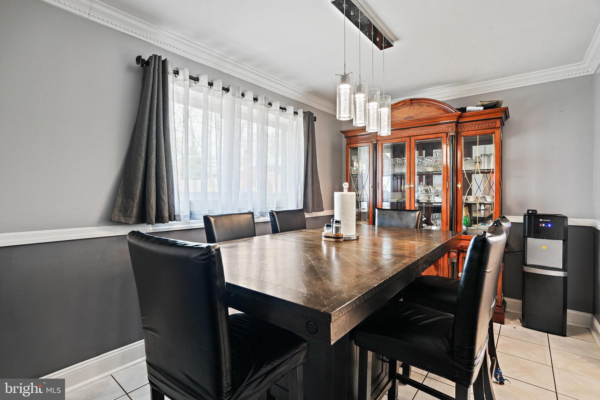 3816 Kayson Street Silver Spring, MD 20906 - Photo 12 of 44 a view of a dining room with furniture and window