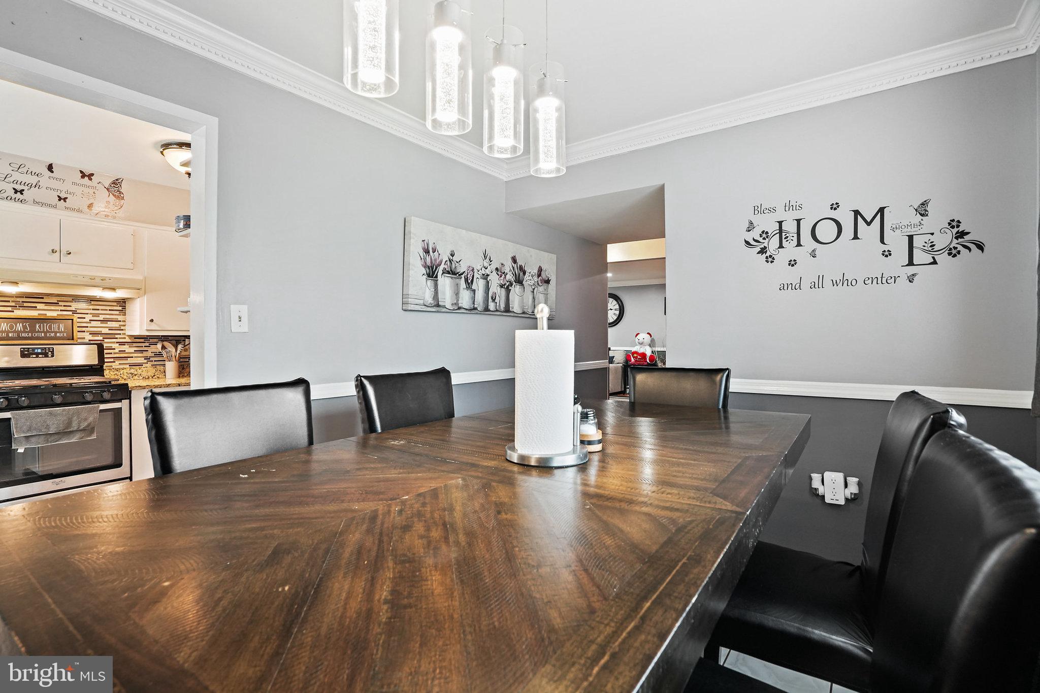 3816 Kayson Street Silver Spring, MD 20906 - Photo 13 of 44 a living room with dining room