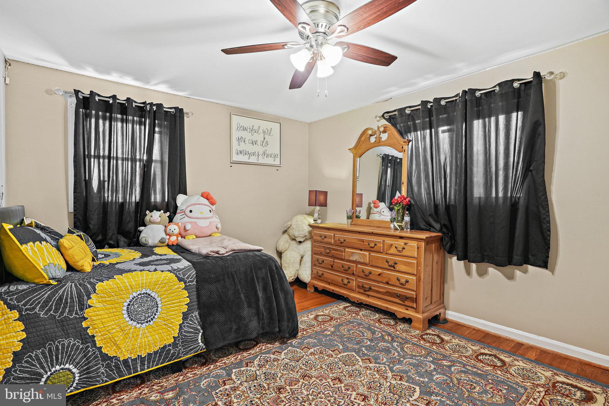 3816 Kayson Street Silver Spring, MD 20906 - Photo 28 of 44 a bed room with a bed and a window