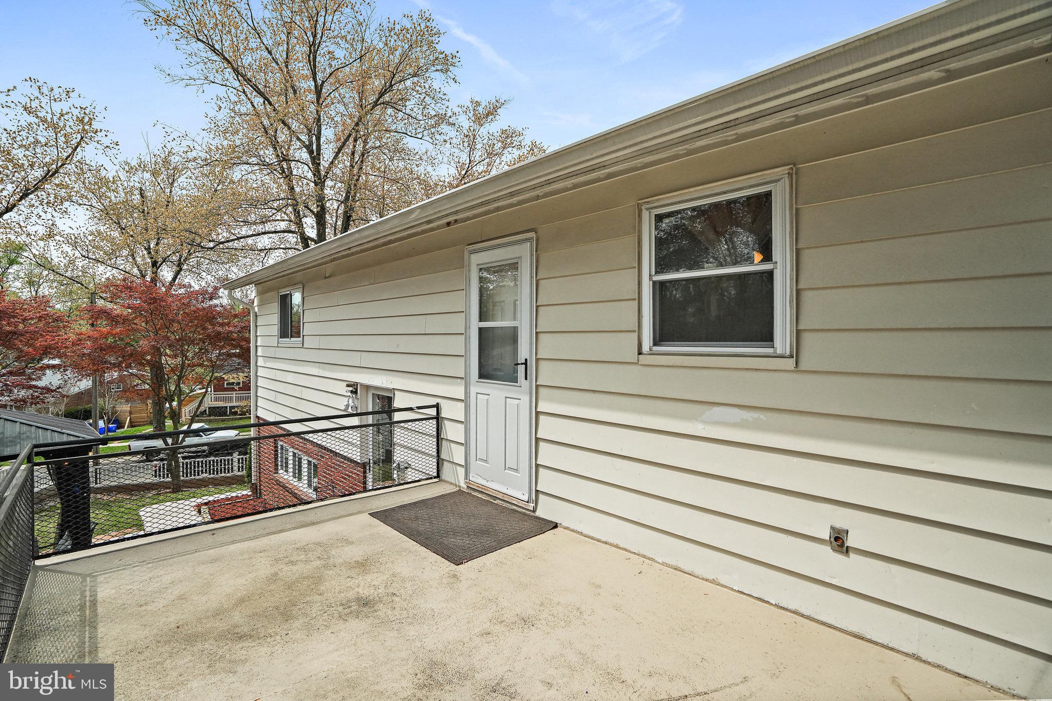 3816 Kayson Street Silver Spring, MD 20906 - Photo 34 of 44 a view of a house with a bench