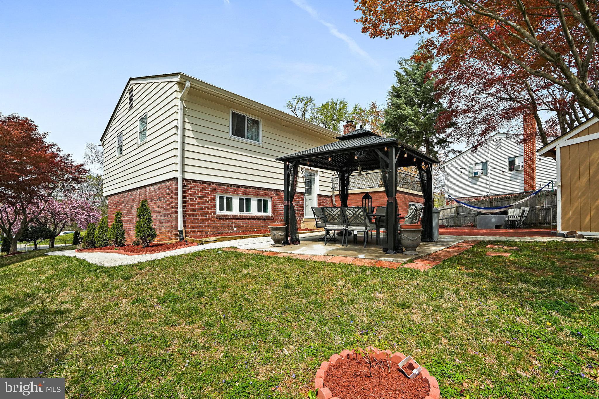 3816 Kayson Street Silver Spring, MD 20906 - Photo 42 of 44 a view of a house with a yard
