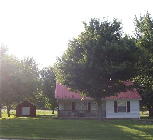 3520 Carthage Road Red Boiling Springs, TN 37150 - Photo 1 of 7 Cute country home w/ 5 beautiful level acres.