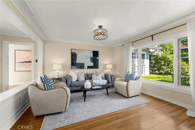 a spacious bedroom with a bed and a book shelf