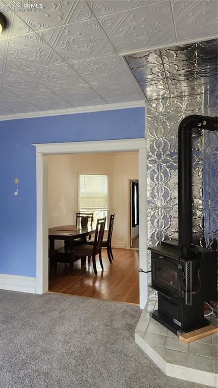 210 7th Street Victor, CO 80860 - Photo 8 of 24 a view of a dining room with furniture and chandelier