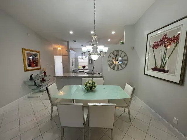 a bedroom with a bed and glass windows