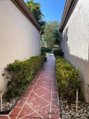 a view of a building with a yard