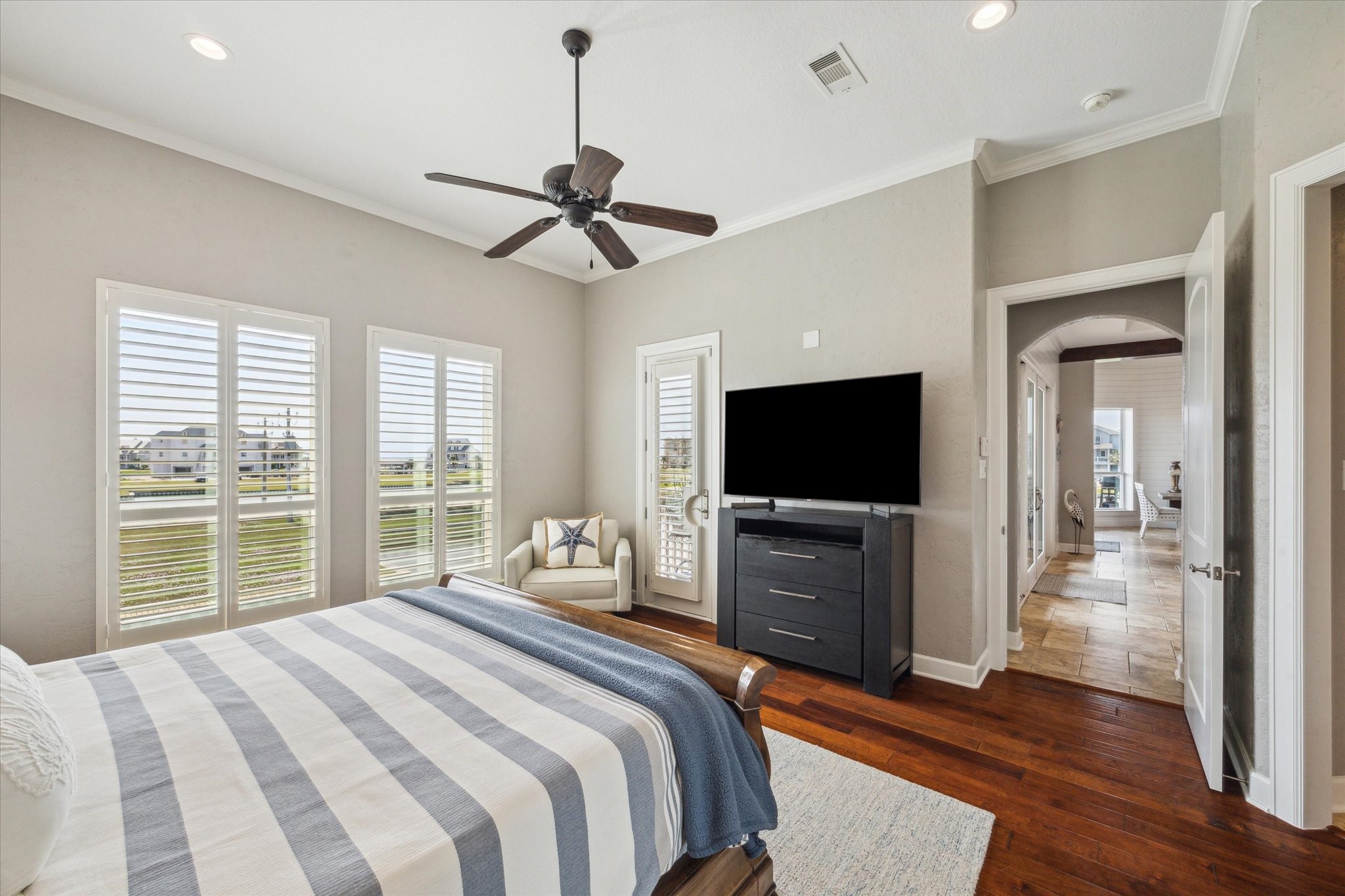 7 Ramrod Hitchcock, TX 77563 - Photo 14 of 41 a bedroom with a bed and a flat screen tv