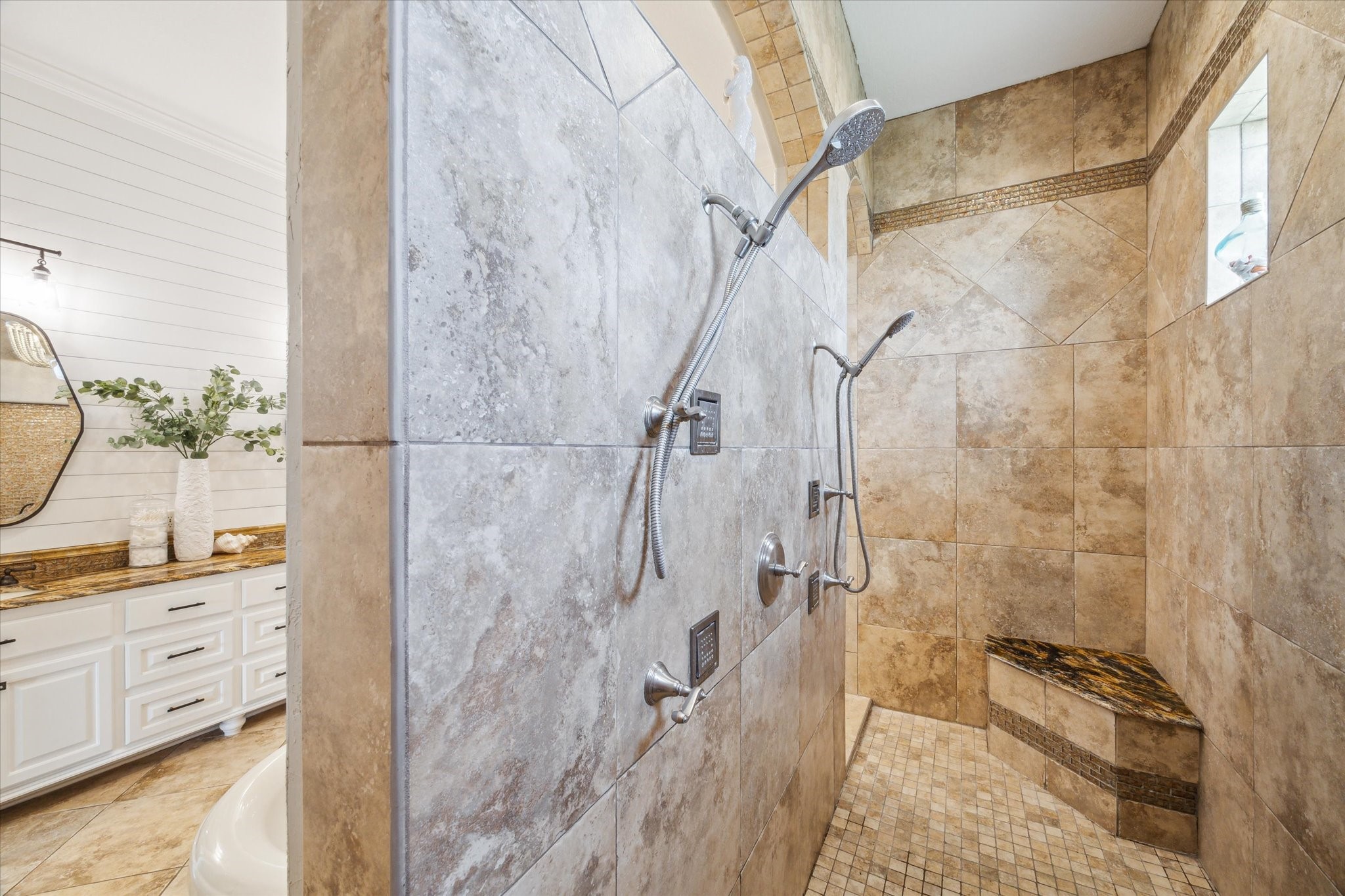 7 Ramrod Hitchcock, TX 77563 - Photo 17 of 41 a bathroom with a granite countertop shower a sink and a mirror