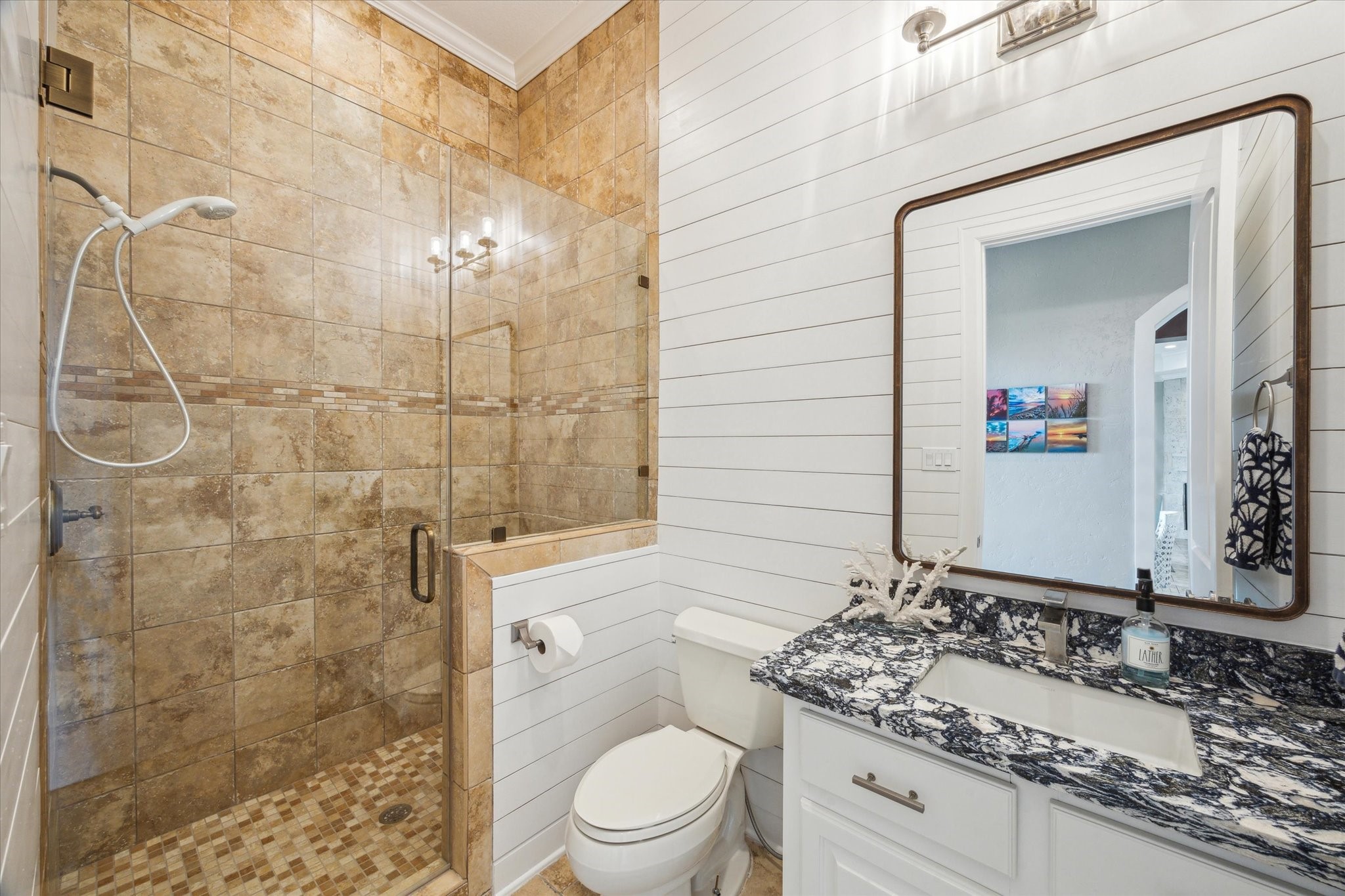 7 Ramrod Hitchcock, TX 77563 - Photo 26 of 41 a bathroom with a granite countertop sink a toilet and shower